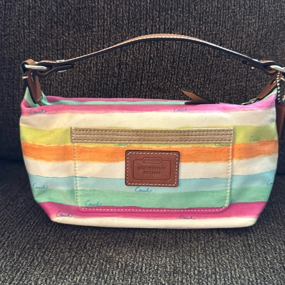 Coach small handbag, brown leather handles, multicolor